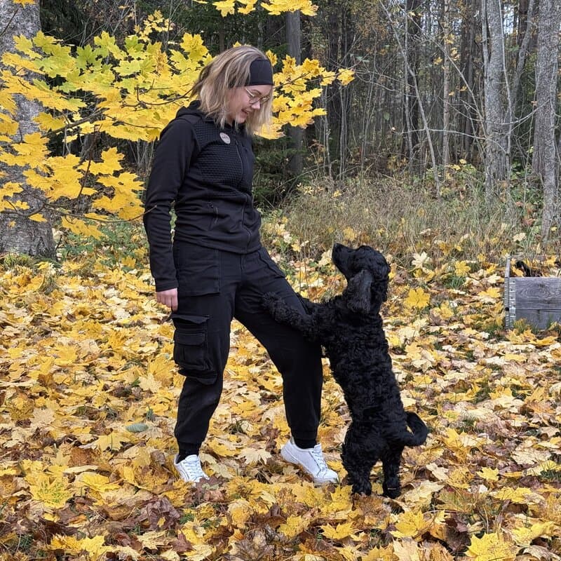 Anu Juhola, professional dog trainer and sergeant in Finnish military K9 unit, providing structured dog training in Hollola and Lahti
